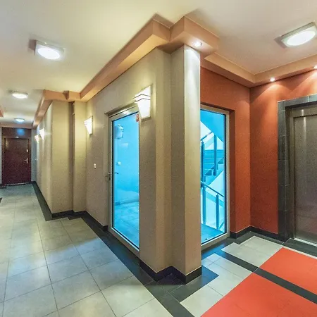 Lägenhet Glow Apartments, Marina